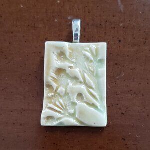 Ceramic artisan handmade floral pendant